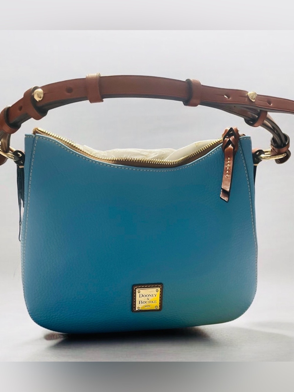 Dooney & Bourke Teal/ sky blue  Pebbled Leather Shoulder Bag with Brown Strap 🩵